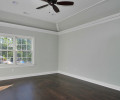 Master Bedroom With Trey and Light Ceiling