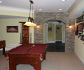 Basement Game room with Stone Arch