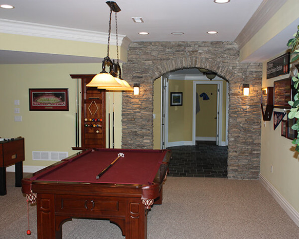 Basement Game room with Stone Arch